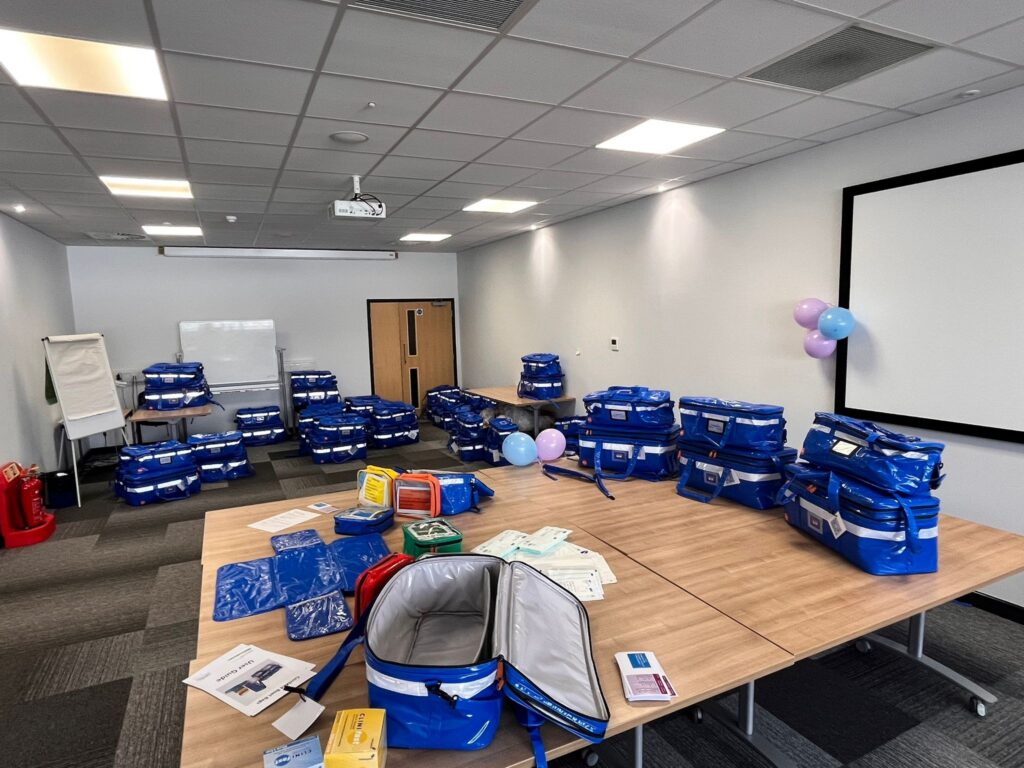 A collection of boot bags being prepared for ECCH staff.