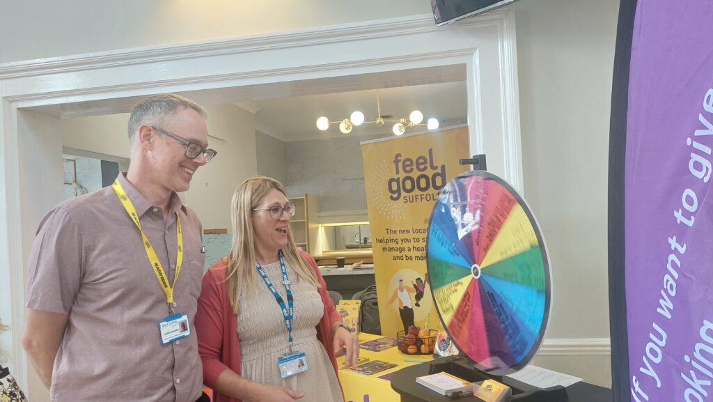 Feel Good Suffolk staff in front of their stand