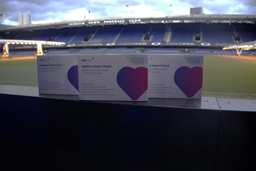 PocDoc health tests on the edge of the seating area at Ipswich Town Football Club with the pitch in the background