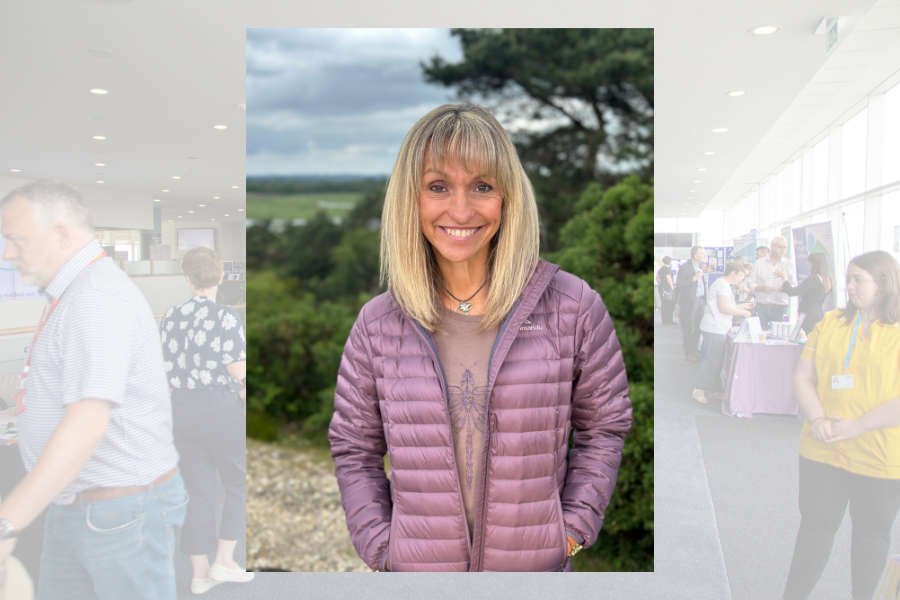 Photo of Michaela Strachan wearing purple puffa coat and smiling at the camera.