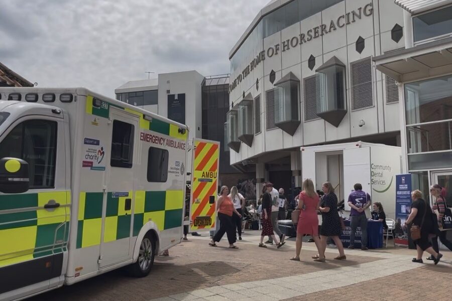 Expo outdoor stage area, with ambulance and mobile dental unit