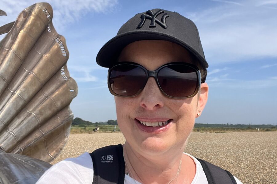 Julie Kerridge smiling on Aldeburgh beach