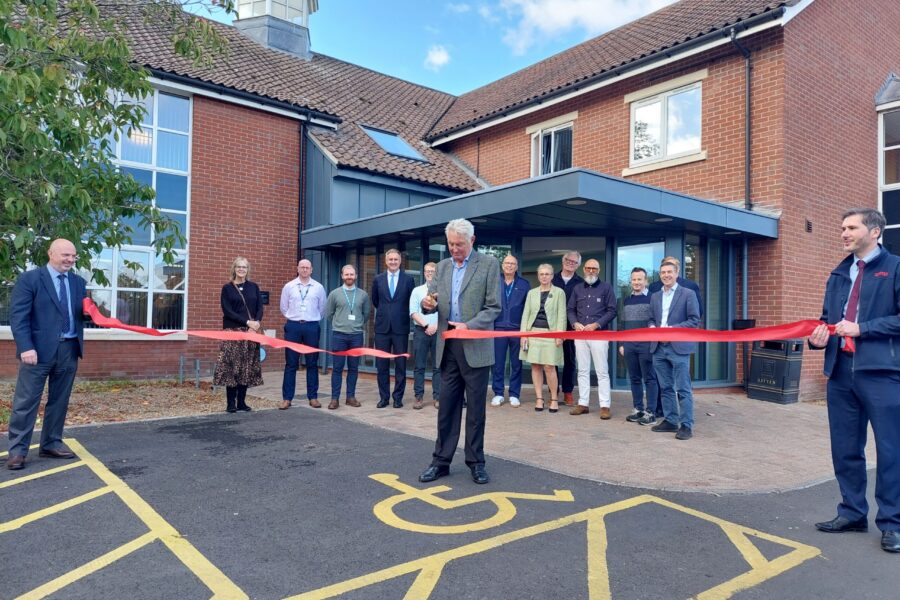 Professor Christopher Hand, Chairman of the Charitable Incorporated Organisation (CIO), cutting the ribbon.